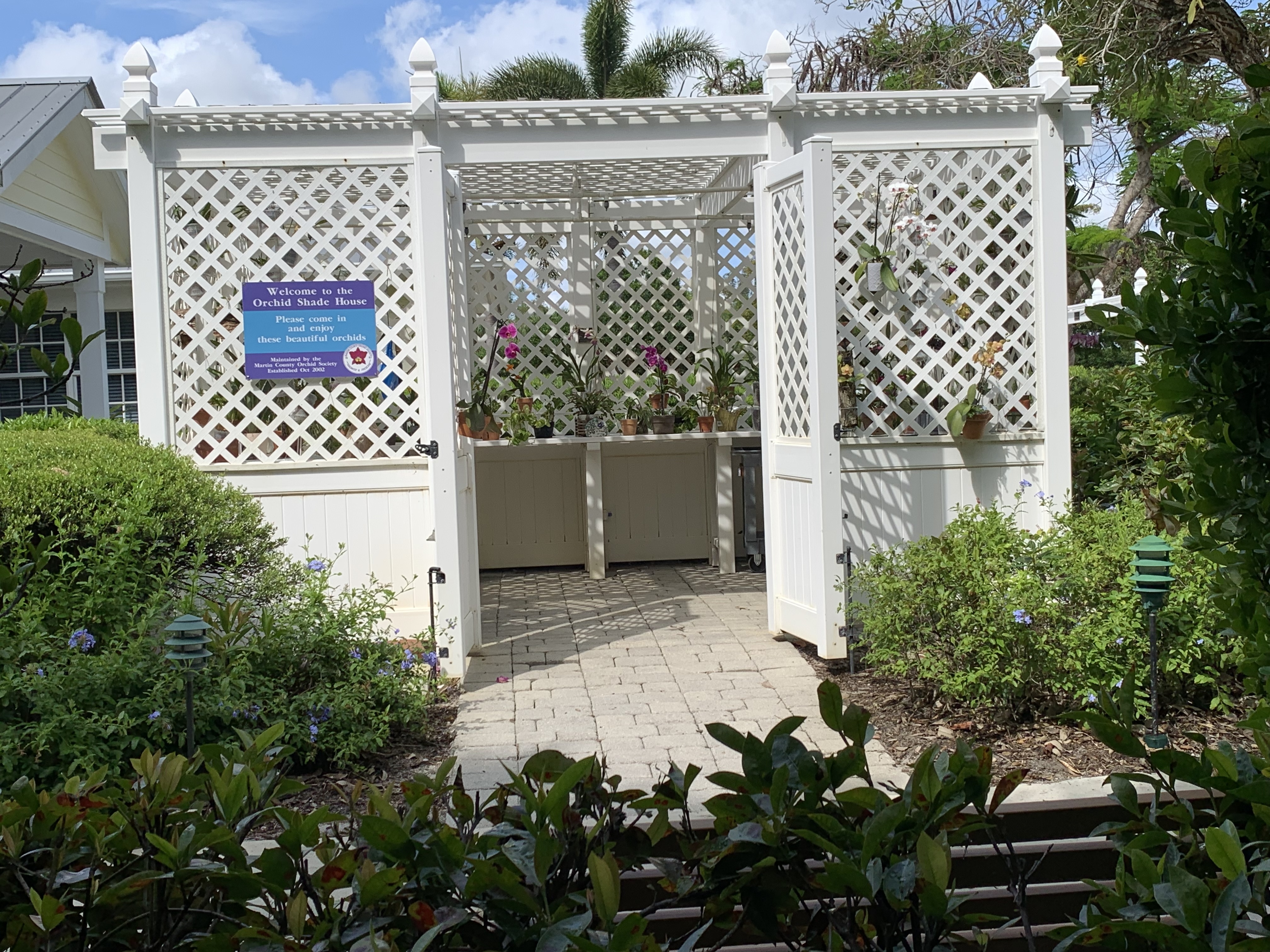 The Martin County Orchid Society Orchid Shade House entrance.